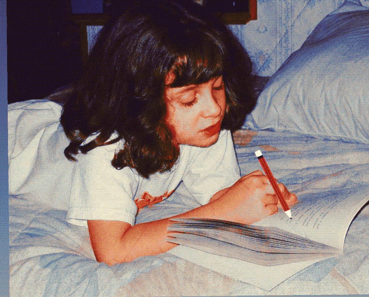 Kiana writing her dissertation
